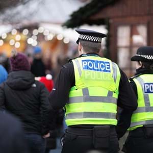 Police officers attending a Christmas market