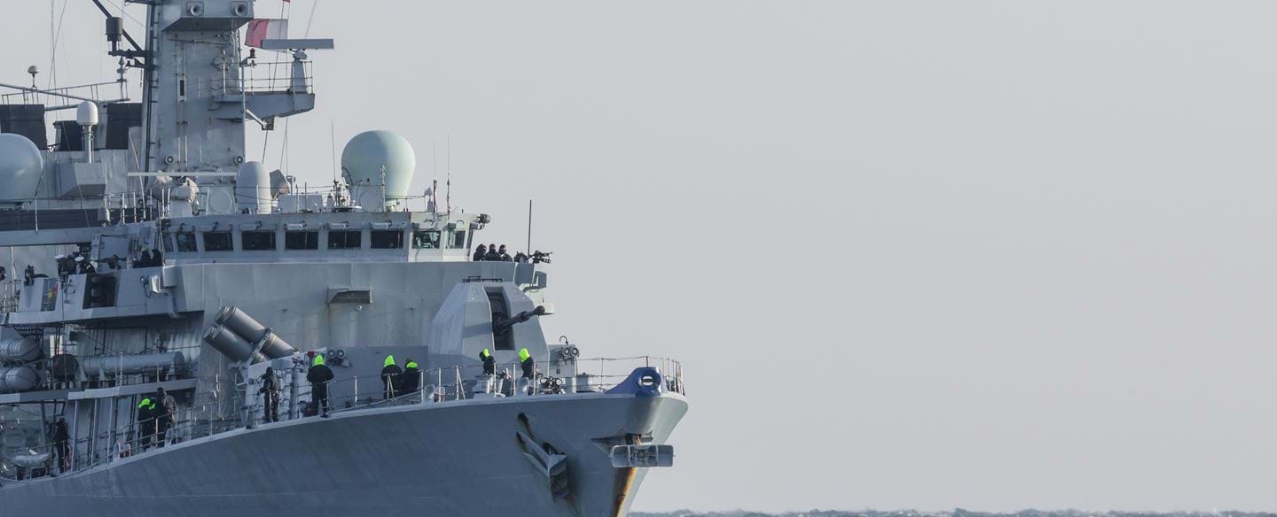 A warship with various communications antennas 