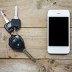 a set of car keys and a mobile phone