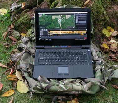 The VIPER software on a ruggedised laptop in a field by a tree