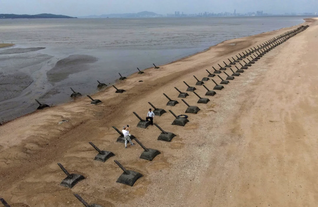 One of Taiwan’s beaches along its eastern coastline, complete with anti-vehicle obstacles in place. Source: NBC News.